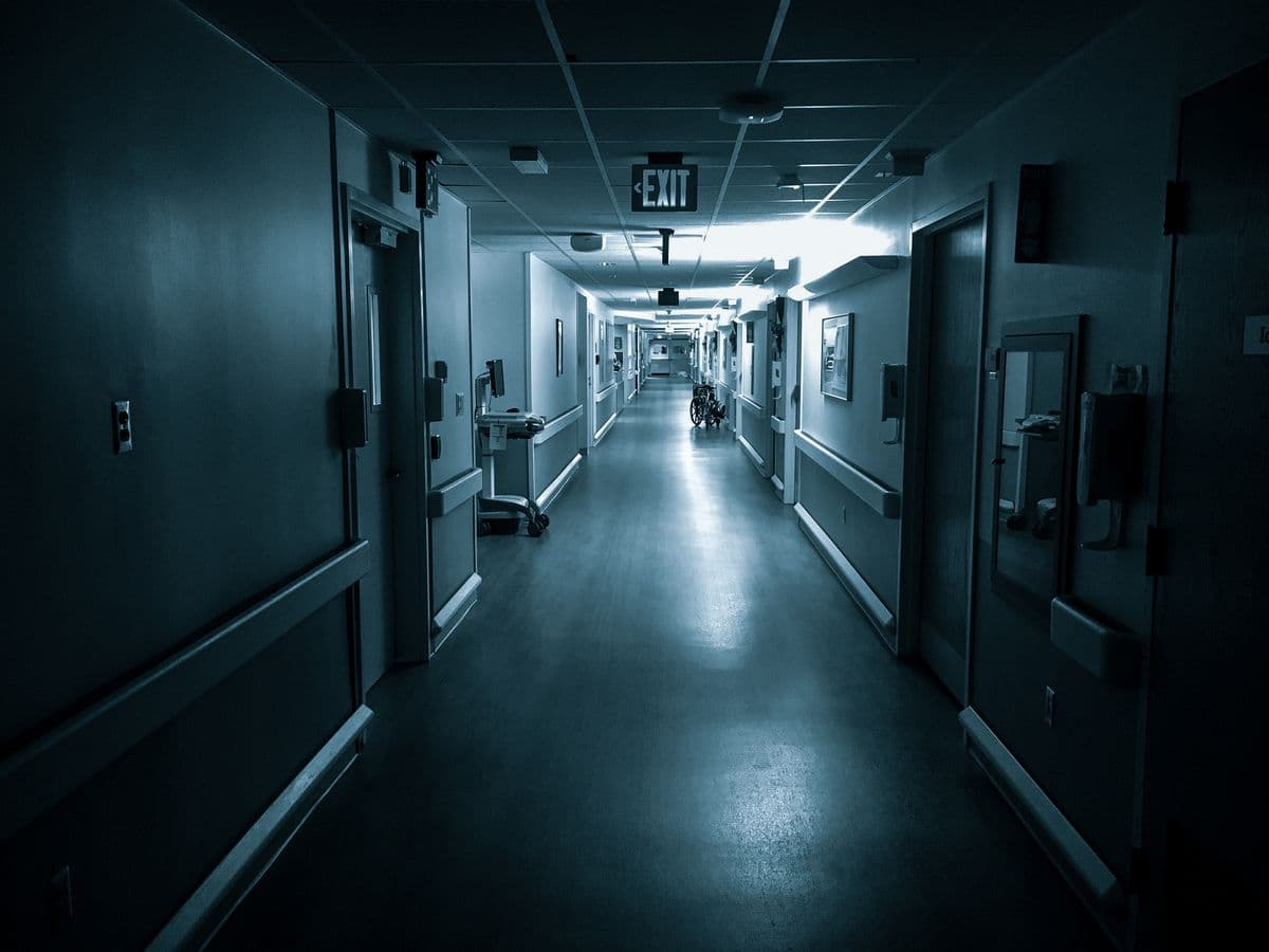 Hospital corridor with ward doors on either side