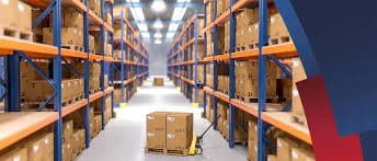 Warehouse aisle with racks of stacked cardboard boxes